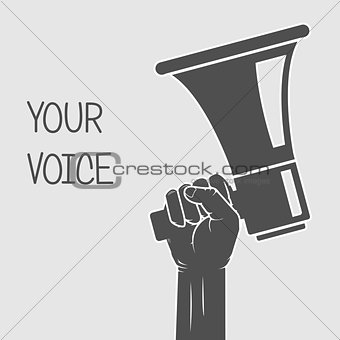 Hand holding megaphone - voice and opinion concept