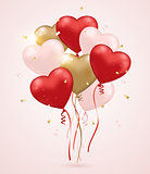 Red and golden heart balloons