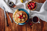 Breakfast with Homemade Pancakes and Fruits.
