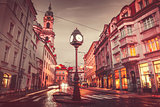 Czech Republic Prague square with old street lamp with clock