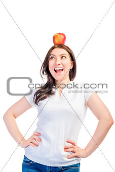 Girl with an apple on her head looking to the side