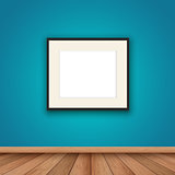Blank picture frame in room interior 
