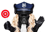 policeman or policewoman with dog with stop sign