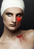 Beauty girl bandage plastic surgery red make up
