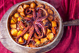 Rich octopus salad with potatoes, baked octopus
