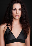 Beautiful sexy girl wearing black silk bra