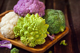Fresh organic white and purple cauliflower, broccoli, romanesco