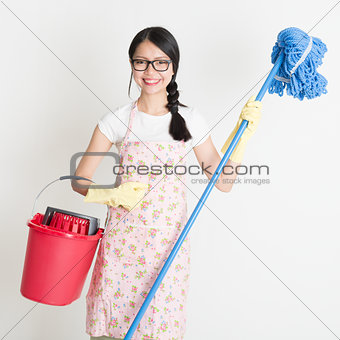 Woman Cleaning with mop and bucket