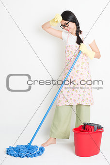 Asian Woman Cleaning with mop and bucket