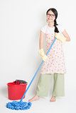 Young Woman Cleaning floor
