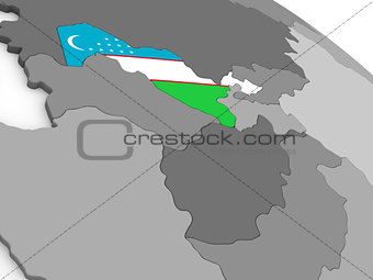 Uzbekistan on globe with flag