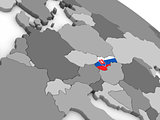 Slovakia on globe with flag
