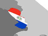 Paraguay on globe with flag