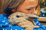 Nice rabbit on girl's shoulder