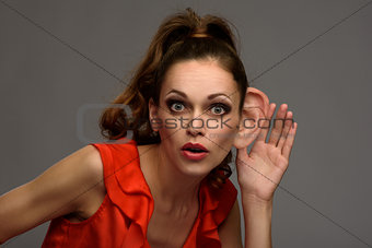 shocked young woman secretly listening conversation