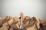 Man buried by a stack  of cardboard boxes. 3D Rendering