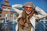 happy young traveller woman in Milan, Italy having fun time