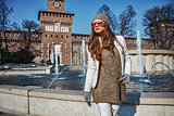 young woman in Milan, Italy looking into distance