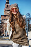 Portrait of happy young tourist woman in Milan, Italy