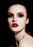 Beauty smokey eyes red lips makeup fashion model