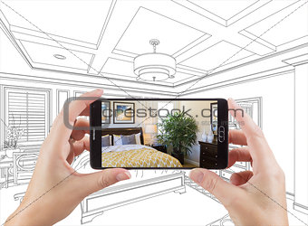 Hands Holding Smart Phone Displaying Photo of Bedroom Drawing Be