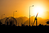 amusement park at sunset