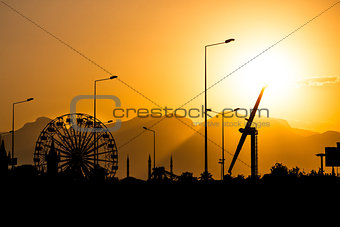 amusement park at sunset