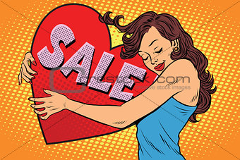 Beautiful young woman hugging sale Valentine heart