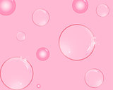 Soap bubbles with reflections pink background