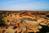 Panorama of rocky pond on Adrar plateau Mauritania