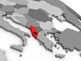 Albania on globe with flag