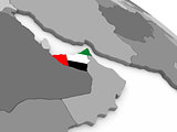 United Arab Emirates on globe with flag