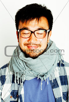 young handsome asian man hipster in glasses on white background