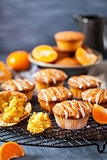 Carrot tangerine cupcakes with glaze and caramel topping 
