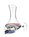 Decanter with wine and grapes in wineglass
