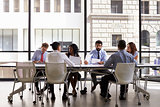 Corporate business team meeting in a modern open plan office