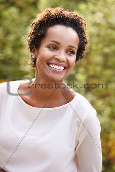 Portrait of young African American woman, looking away