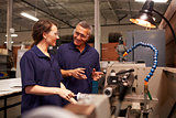 Engineer Training Female Apprentice On Milling Machine