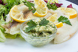 steamed tilapia fish with salad and tartar sauce