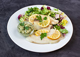steamed tilapia fish with salad and tartar sauce