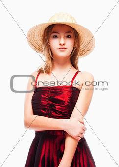 Girl in Red Dress and Stray Hat on her Head