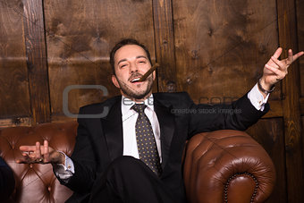 Rich businessman with cigar