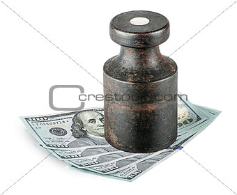 Banknotes clamped old rusty weights