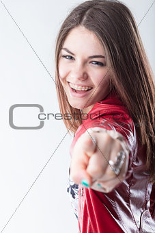 girl laughing and pointing out