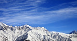 Panoramic view on winter mountains at sun winter day