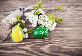 Easter eggs with spring flowers blooming tree
