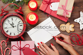 Writing christmas greeting card
