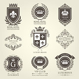 Luxurious heraldic emblems and badges with shields and crowns