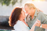 Middle Aged Couple Enjoy A Romantic Slow Dance Outside