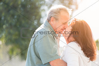 Middle Aged Couple Enjoy A Romantic Slow Dance and Kiss Outside